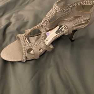 Silver heel never worn